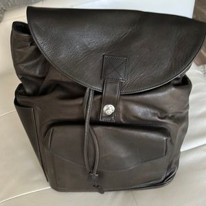 A spinneybeck leather book bag. Great for laptops and any of what you desire.